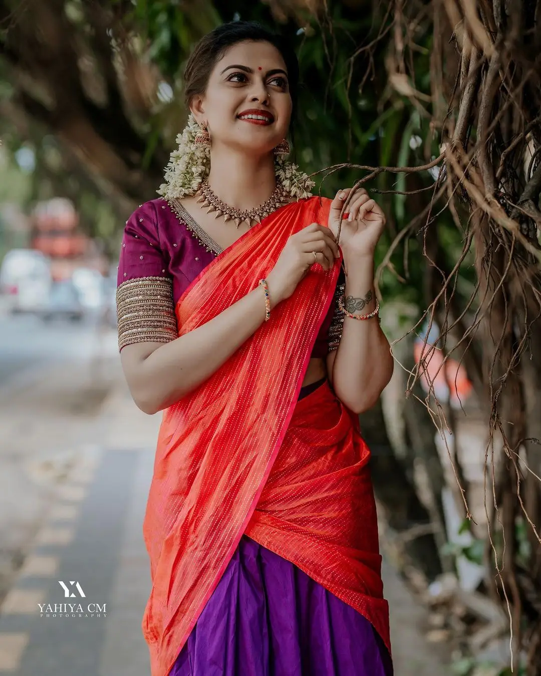 Anusree Nair in Beautiful Earrings Jewellery Red Saree Blue Blouse